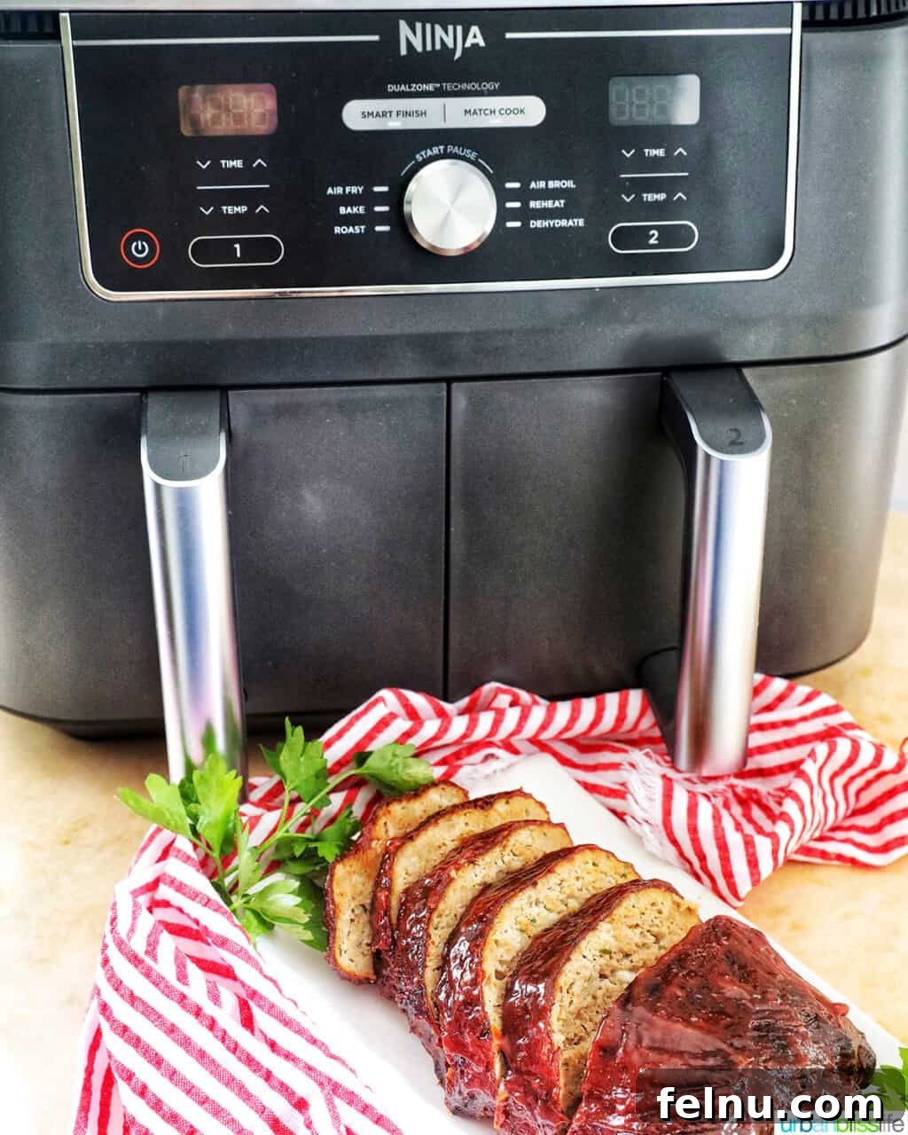 Air Fryer Meatloaf Magic 13 Air fryer and sliced meatloaf