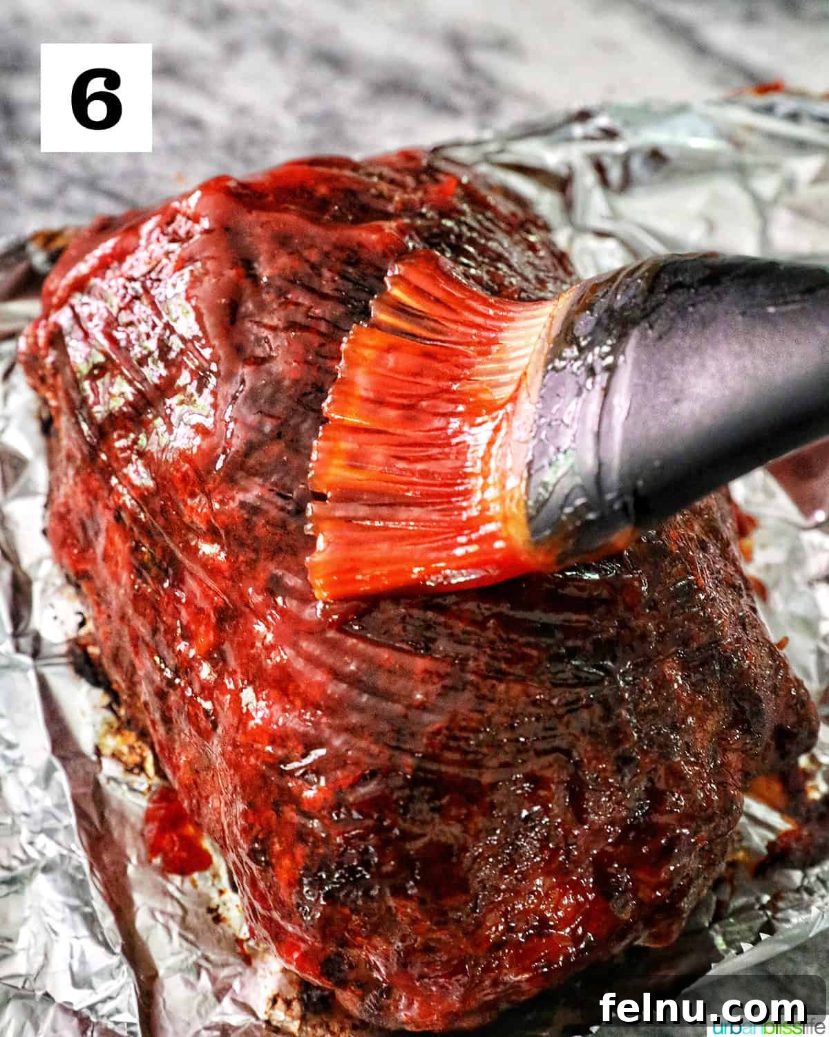 Air Fryer Meatloaf Magic 10 Brushing glaze on meatloaf
