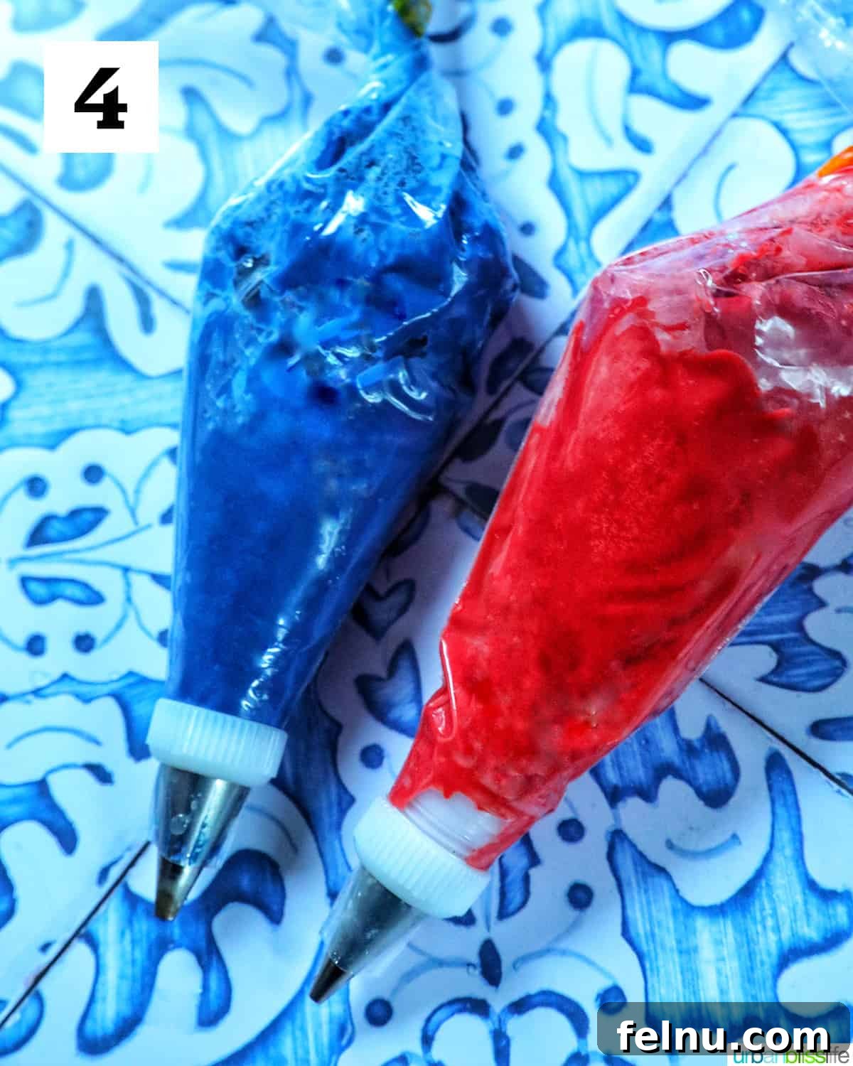 Fourth of July-Themed Oreo Delights 9 Red and blue candy melts melted and in piping bags.