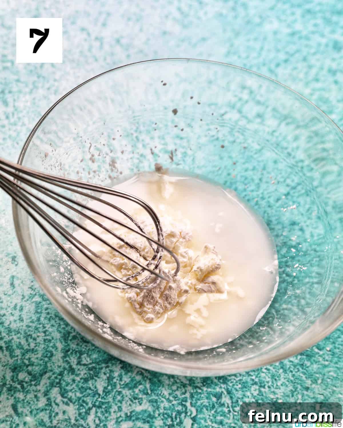 Instant Pot Chicken Thigh Recipe: Quick, Easy, and Delicious 12 Cornstarch slurry being whisked in a bowl