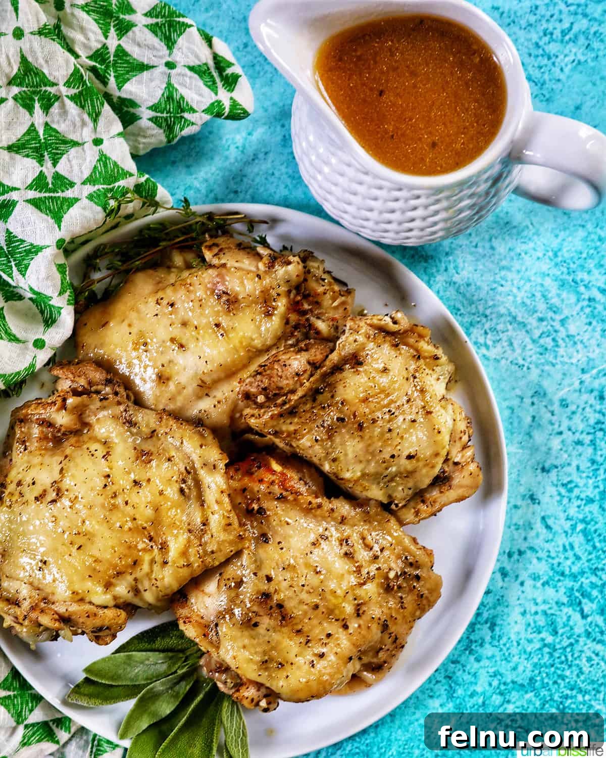 Instant Pot Chicken Thigh Recipe: Quick, Easy, and Delicious 3 Juicy Instant Pot Chicken Thighs with gravy on a white plate