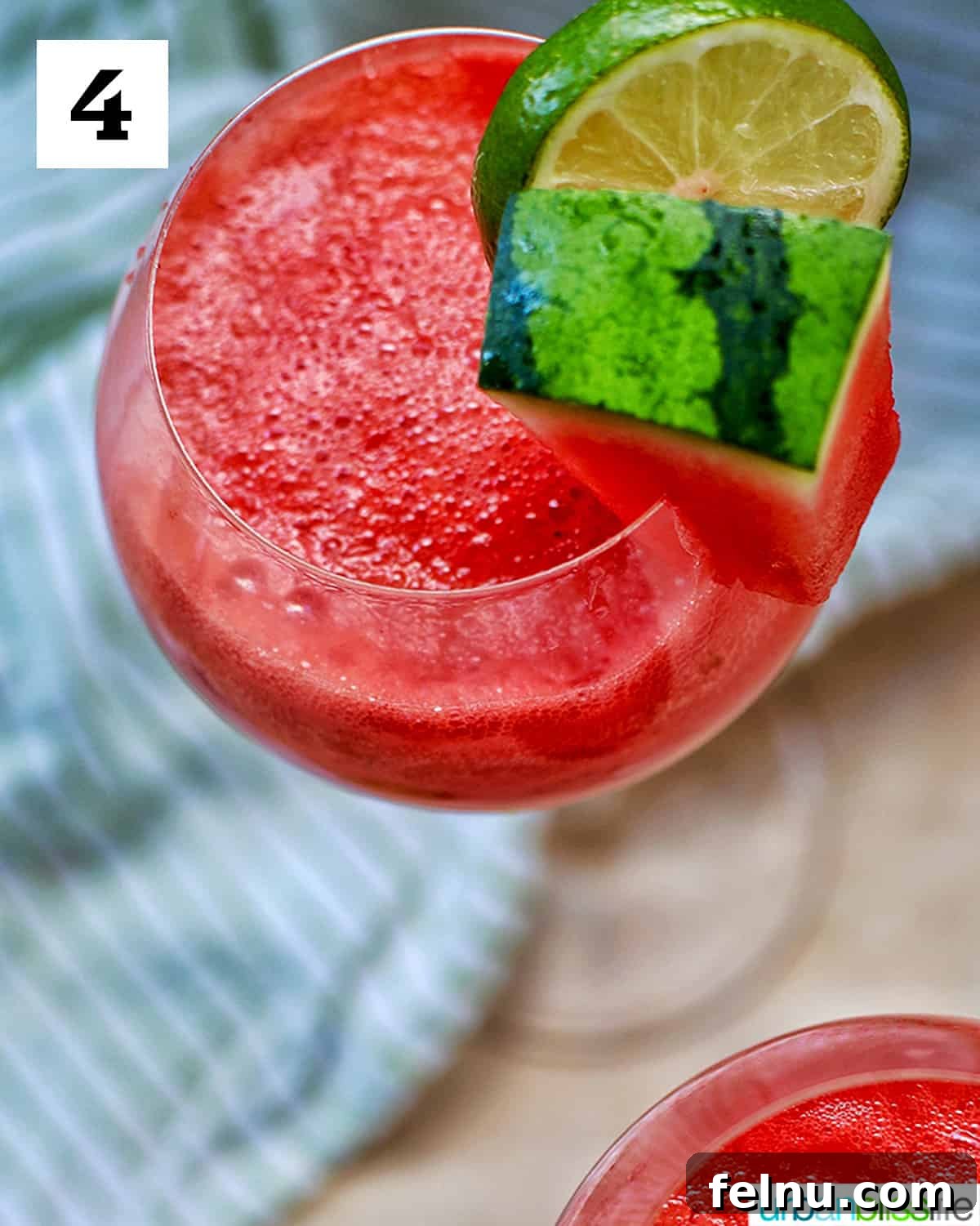 Watermelon Sunset Fizz 10 A final close-up of a perfectly prepared Watermelon Mimosa, showcasing its beautiful color and refreshing garnishes, ready to be enjoyed.