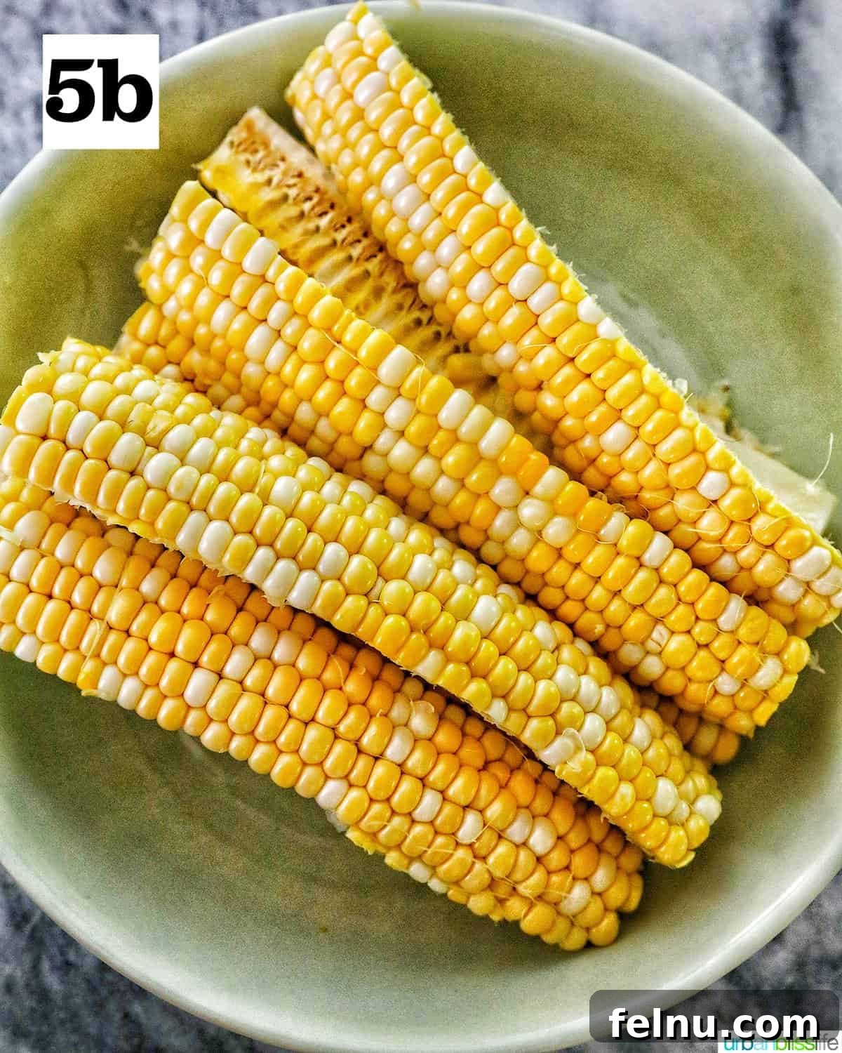 Air Fryer Corn "Ribs": A Crispy, Healthy Twist on a Classic 11 Bowl of sliced raw corn ribs.
