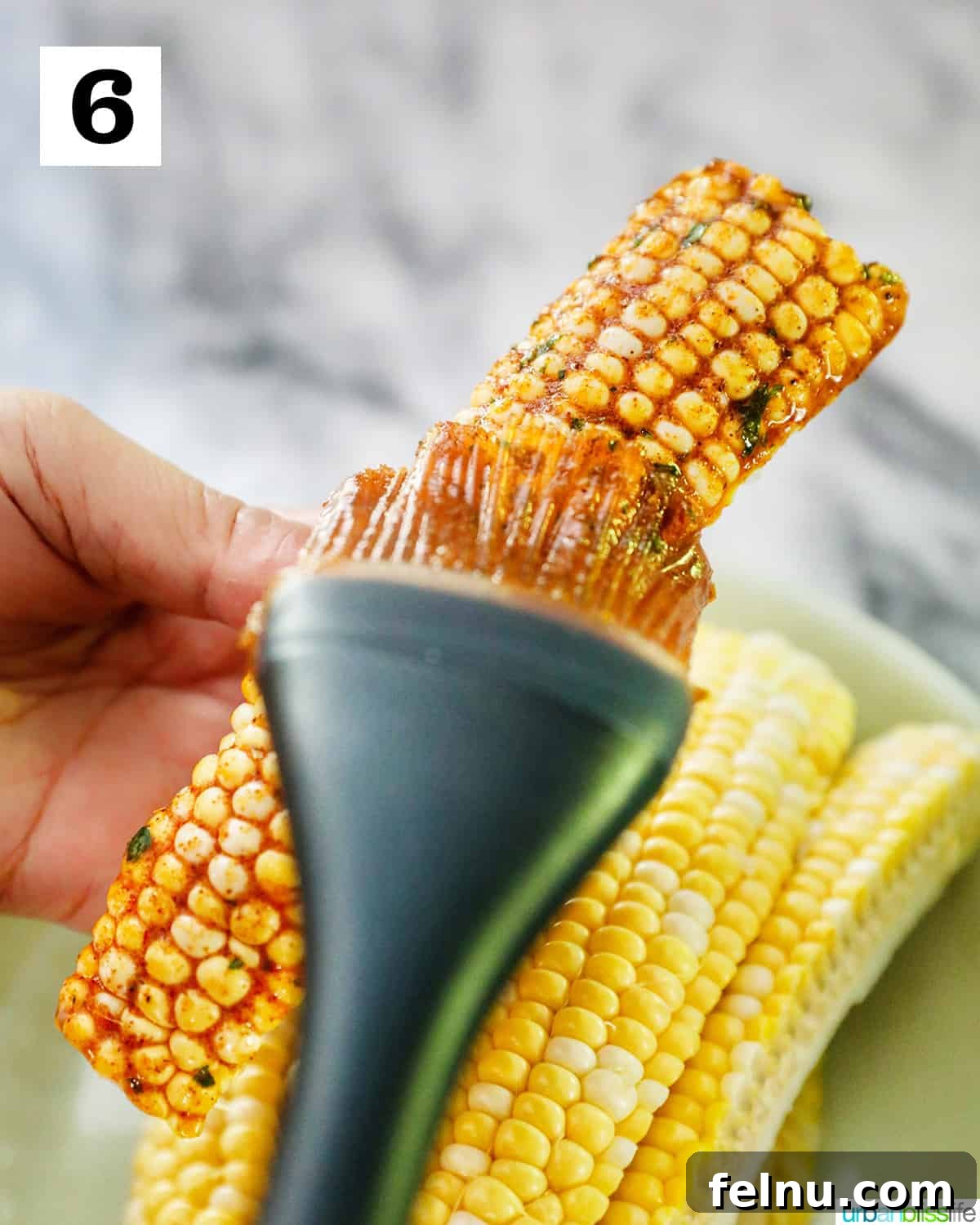 Air Fryer Corn "Ribs": A Crispy, Healthy Twist on a Classic 12 Basting the corn rib with sauce.