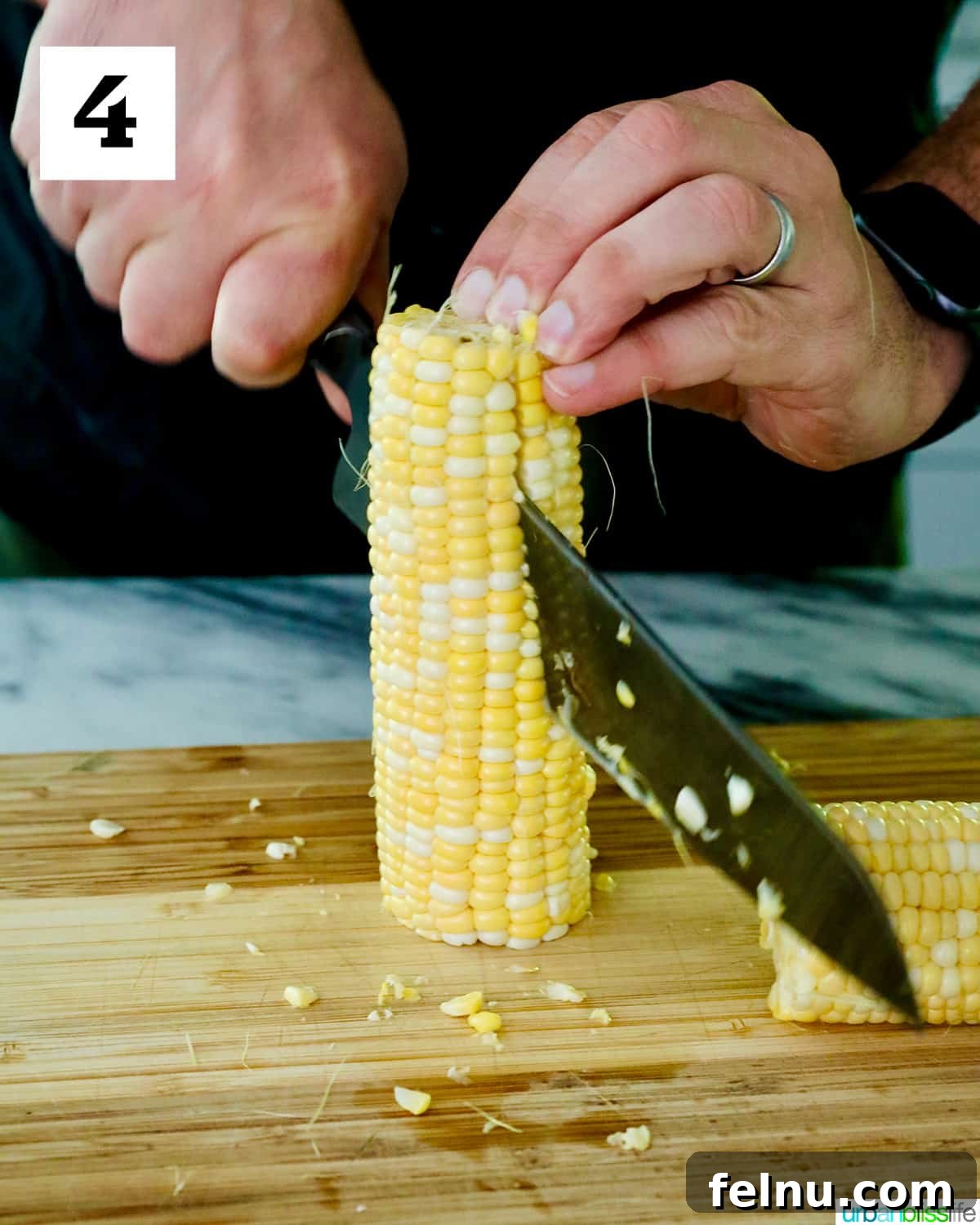 Air Fryer Corn "Ribs": A Crispy, Healthy Twist on a Classic 9 Slicing the corn in half.
