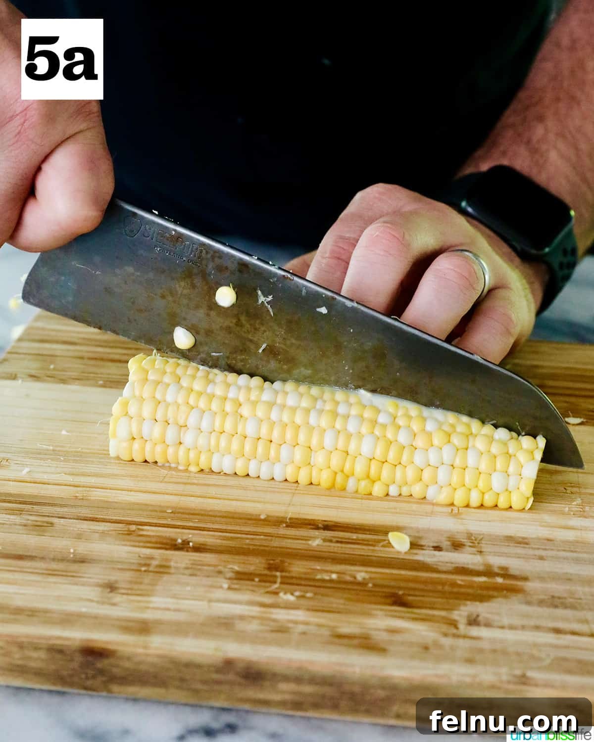 Air Fryer Corn "Ribs": A Crispy, Healthy Twist on a Classic 10 Slicing the halved corn into quarters.