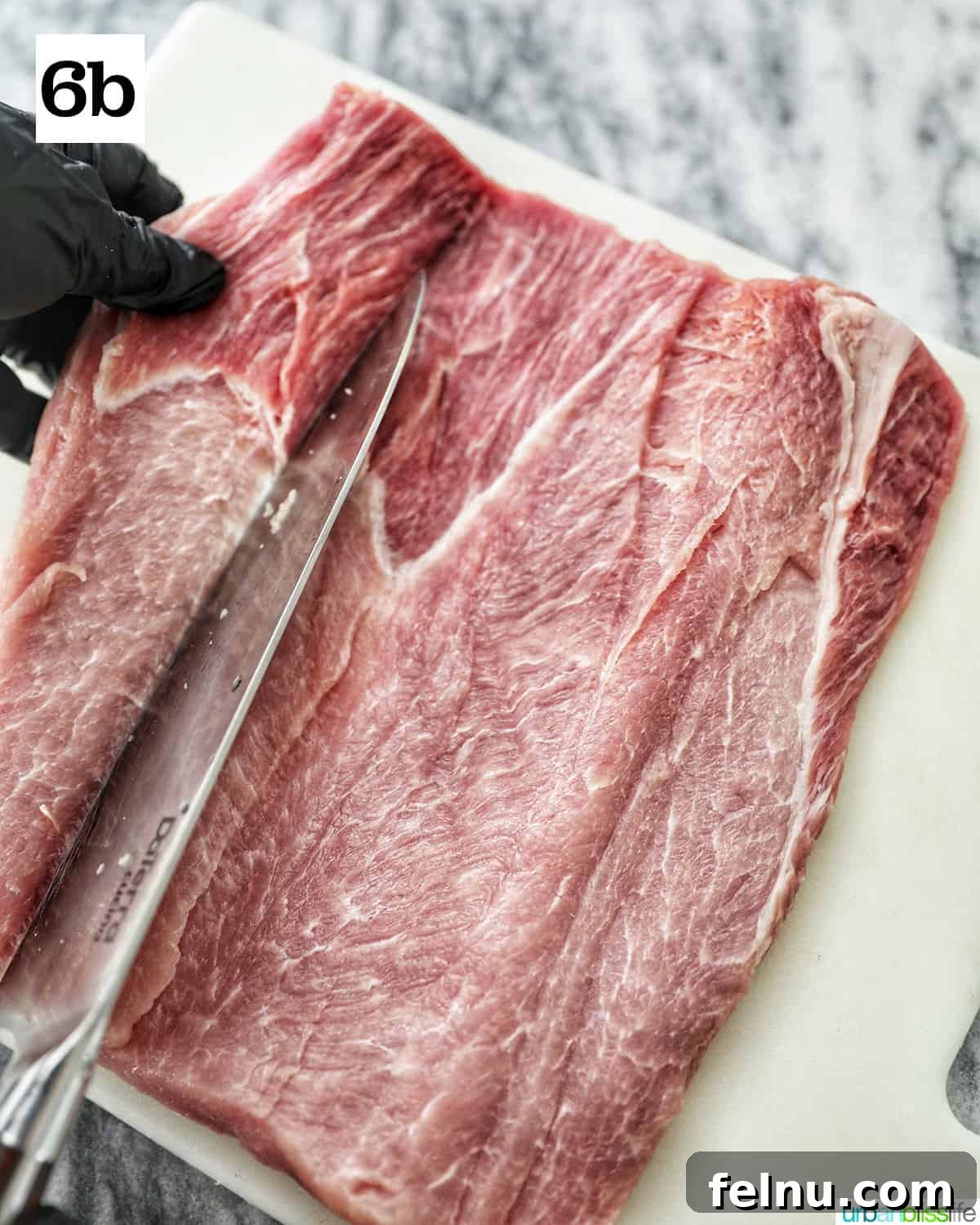 Instant Pot Pork Loin: A Flavorful One-Pot Wonder 11 Continuing to slice the pork loin