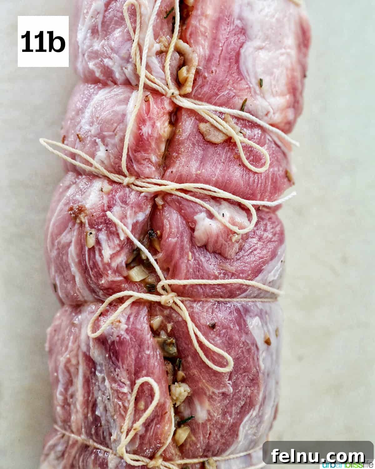 Instant Pot Pork Loin: A Flavorful One-Pot Wonder 18 Tied pork loin on a cutting board