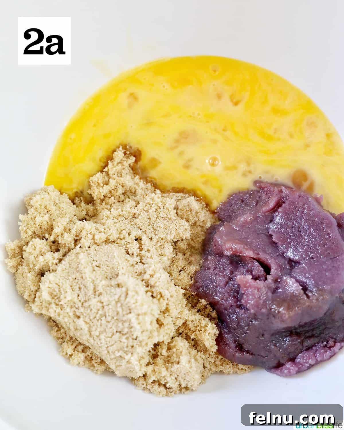 Ube Dream Donuts 7 White bowl with brown sugar, eggs, ube jam.