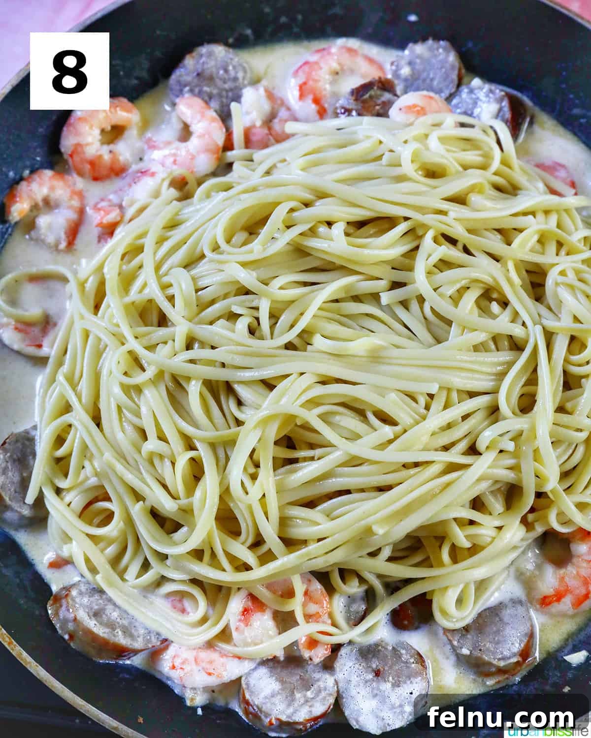 Savory Seafood & Sausage Skillet 12 Adding Pasta