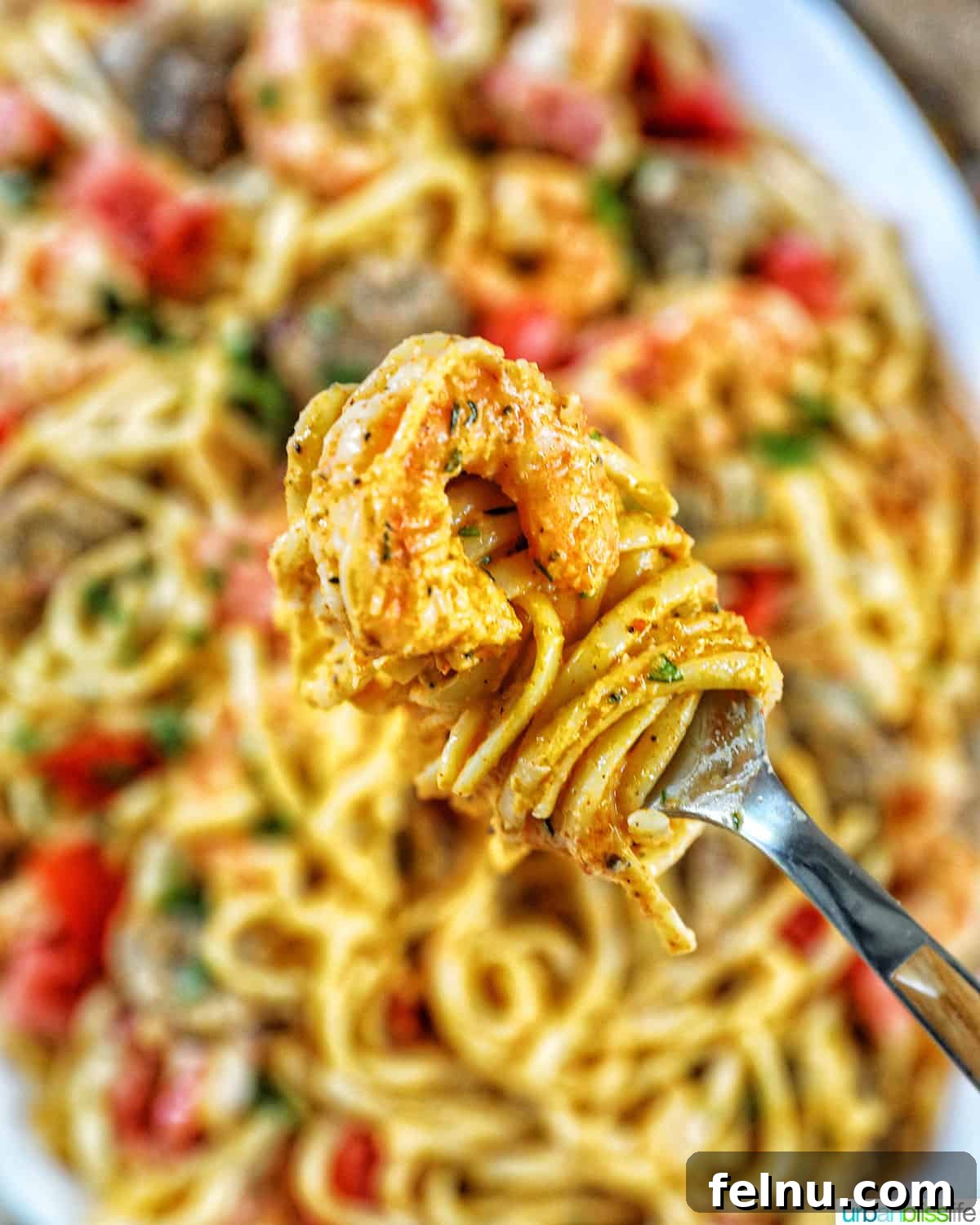Savory Seafood & Sausage Skillet 3 Shrimp and Sausage Pasta on Fork