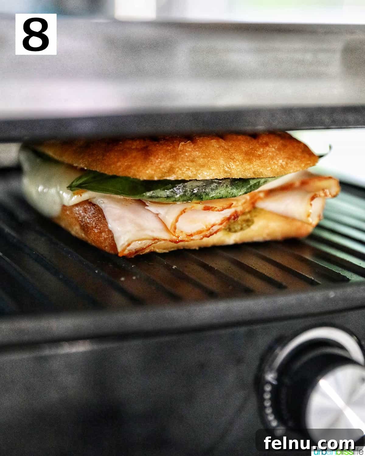Turkey Pesto Sandwich in a panini press