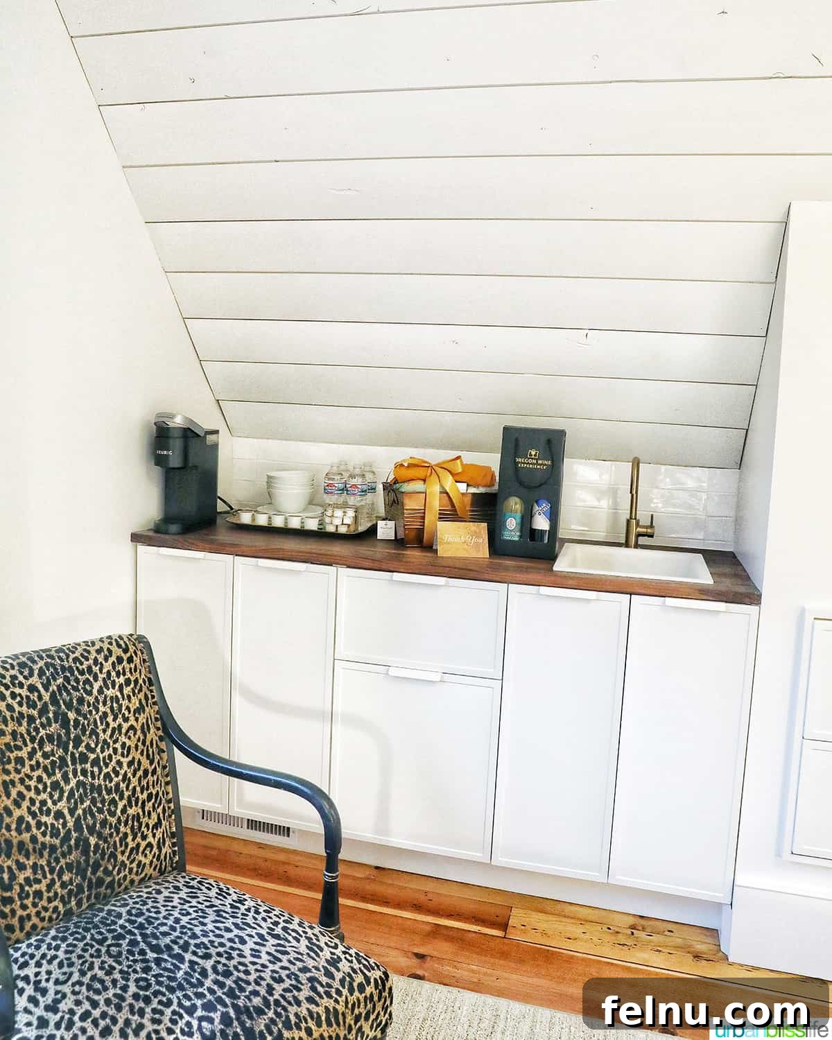 A well-equipped kitchenette and sink area within Kubli Haus Suite 3.