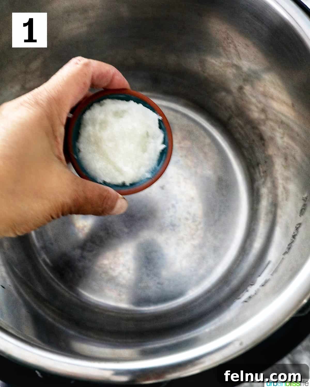 Instant Pot Popcorn Perfection 5 Pouring coconut oil into an Instant Pot