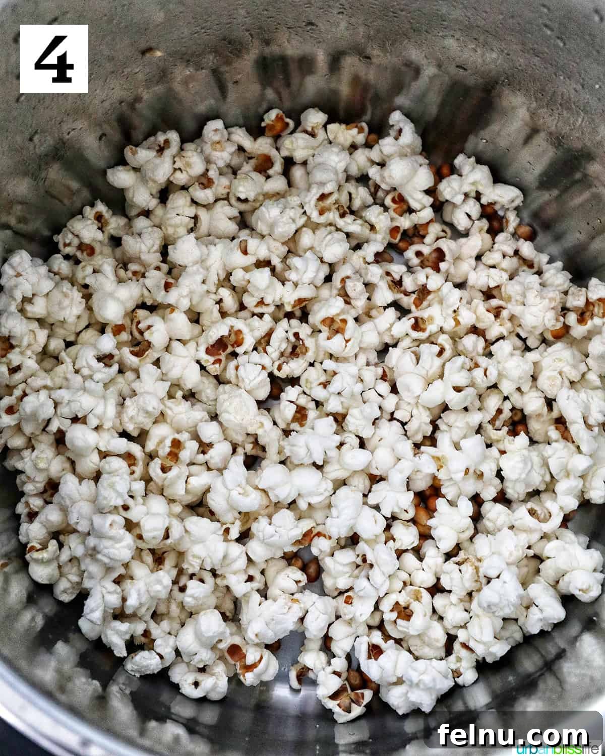 Instant Pot Popcorn Perfection 7 Popped popcorn inside an Instant Pot