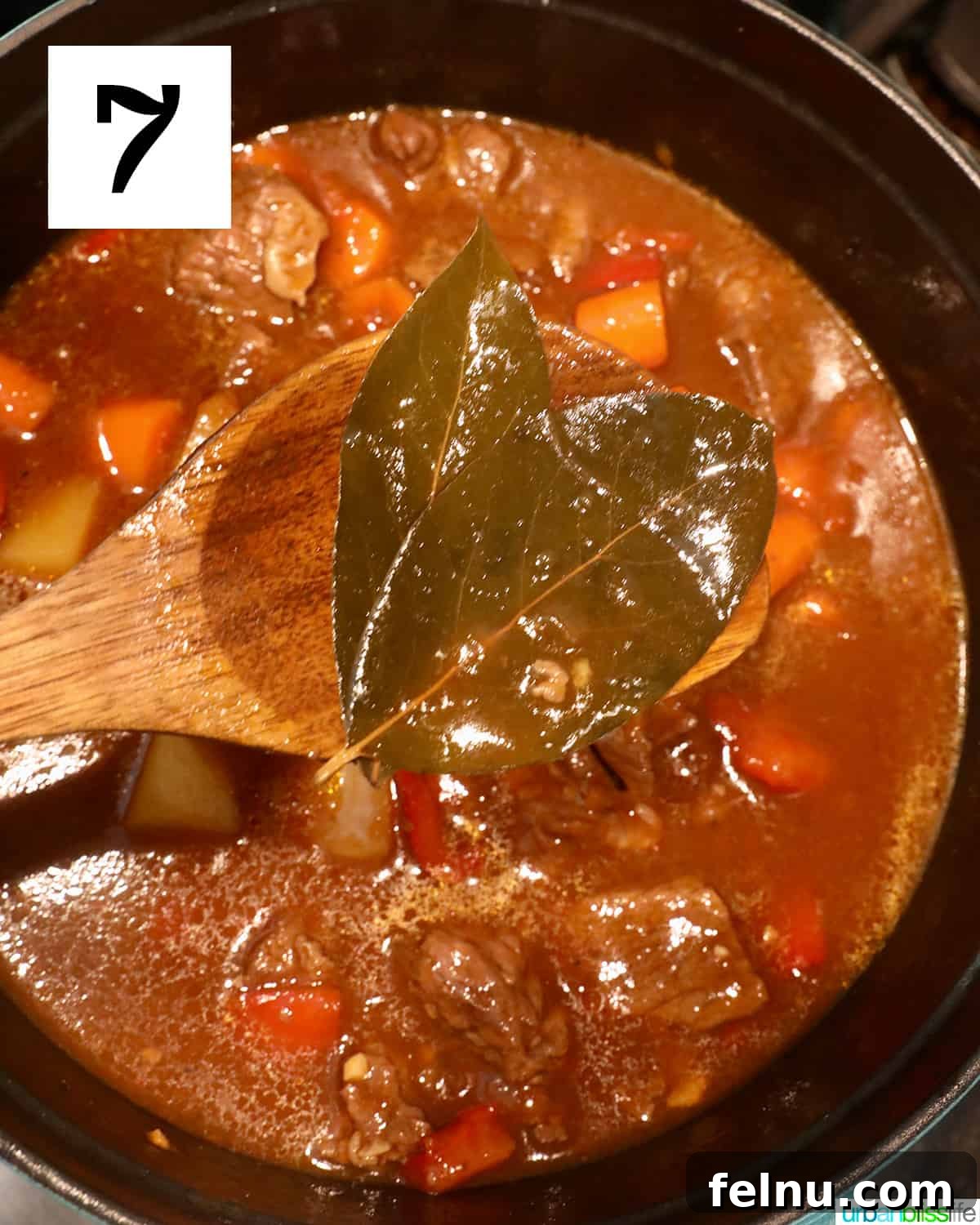 Hearty Filipino Beef Stew: Mechado 11 Removing bay leaves