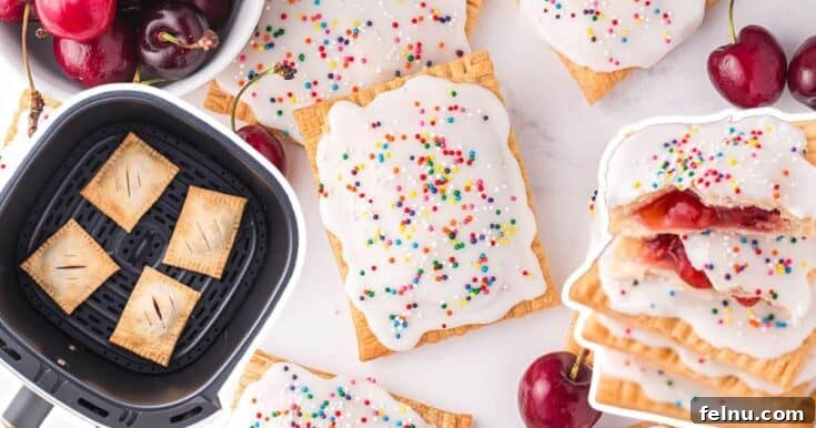 Homemade air fryer cherry pop-tarts with a sweet glaze.