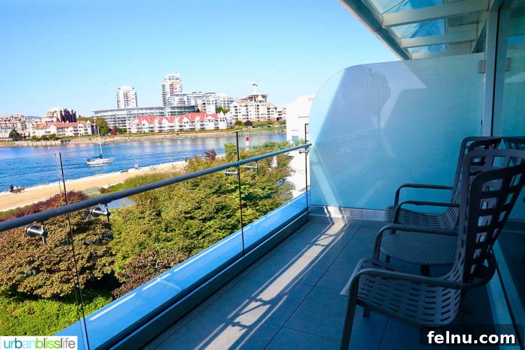 The Laurel Point Haven 6 terrace overlooking Victoria Harbour - part of erickson wing studio suite at the Inn at Laurel Point hotel in Victoria BC Canada.