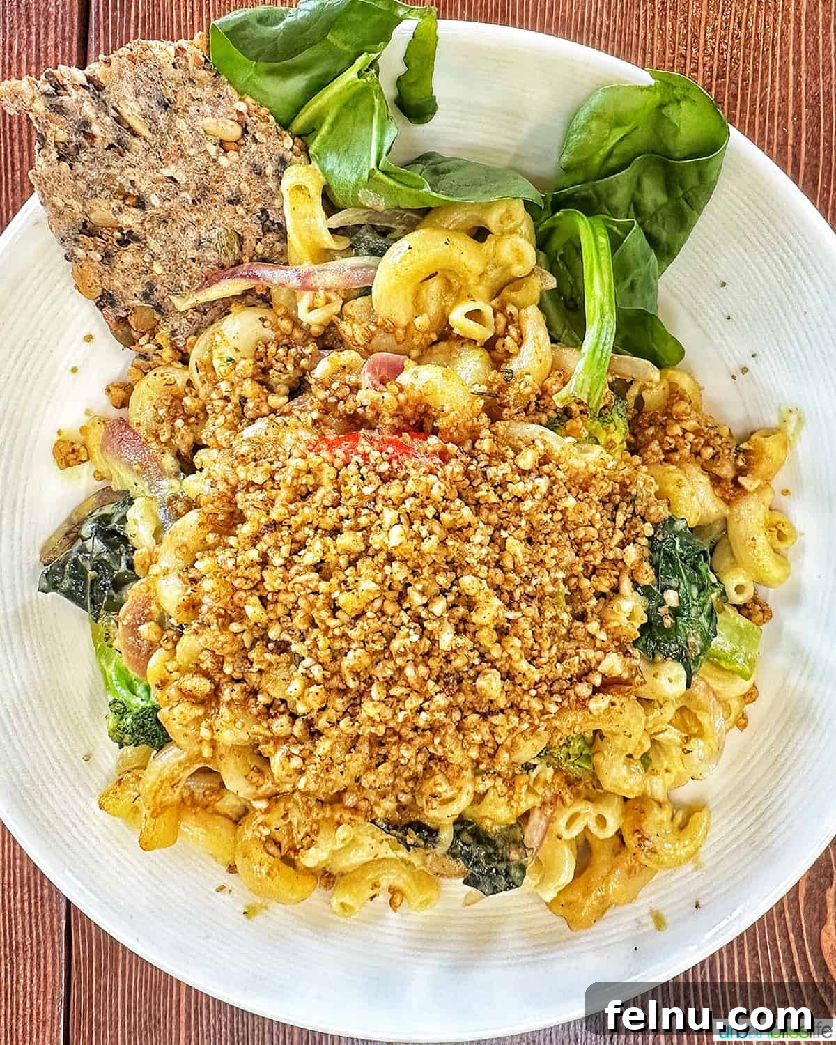 Downtown Victoria's Food Scene 8 A vibrant and appetizing plant-based pasta dish, likely featuring fresh vegetables and a rich, creamy sauce, served in a bowl at BeLove restaurant.