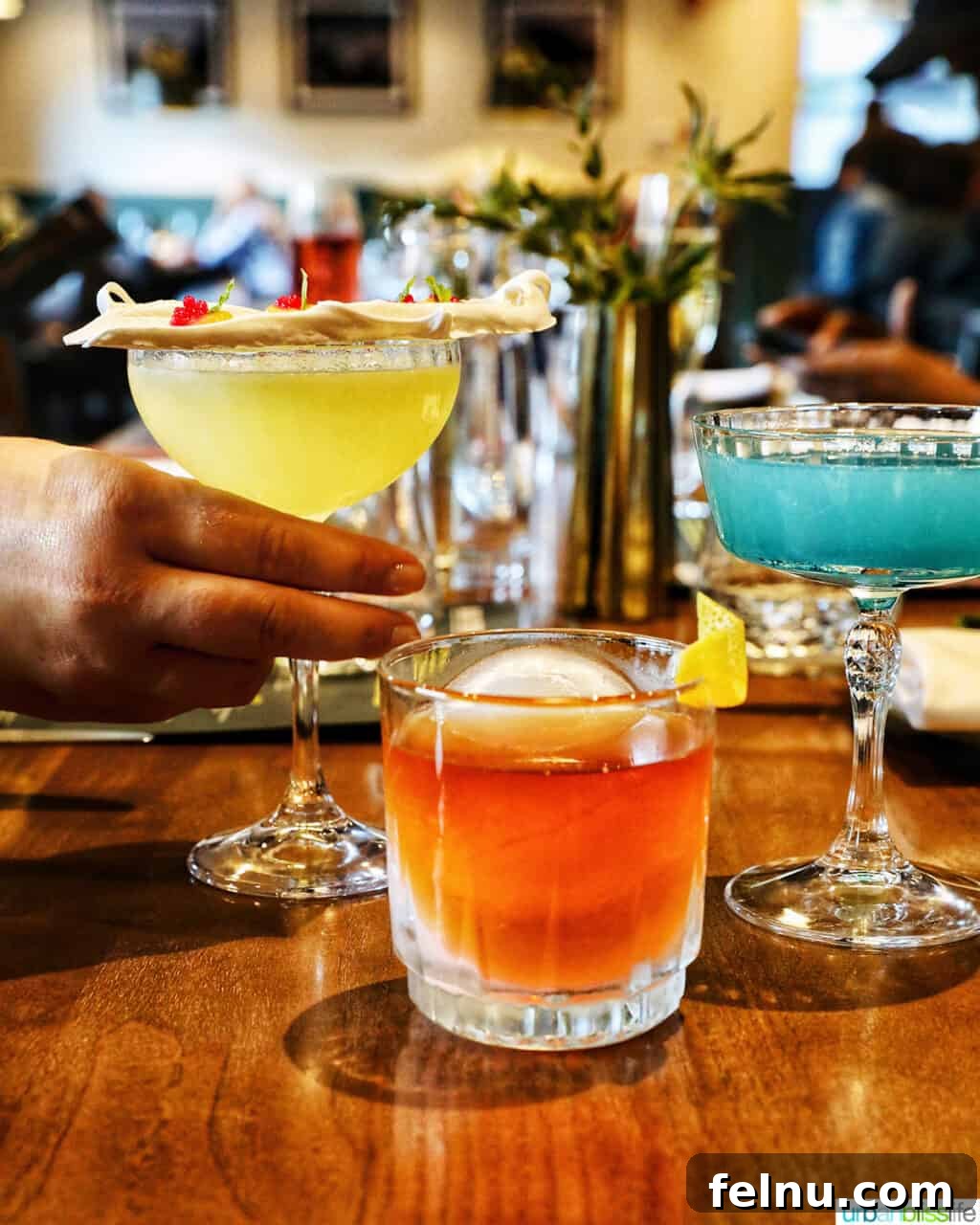 Banff Unleashed 4 Trio of colorful cocktails at Brazen Banff, each uniquely presented and vibrant.