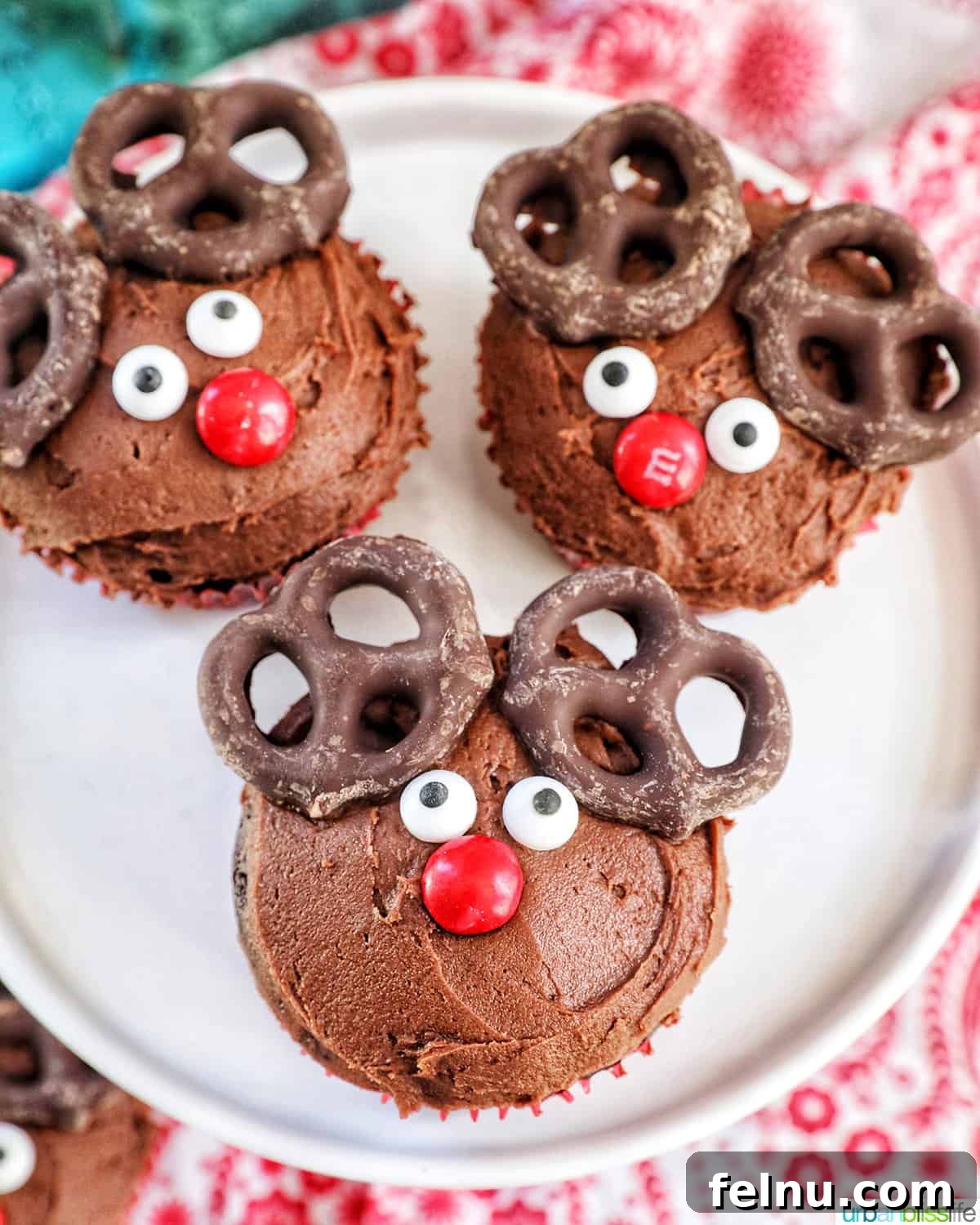 Reindeer Delight Cupcakes 2 Three reindeer cupcakes on a plate