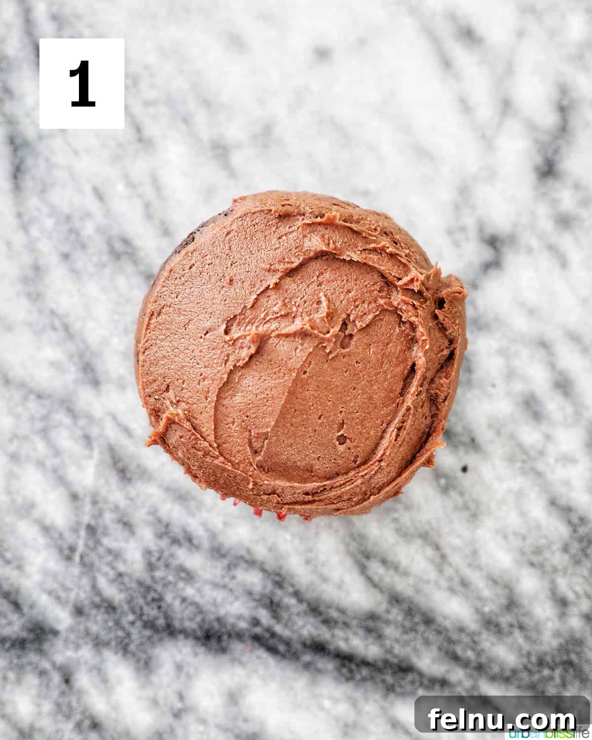 Reindeer Delight Cupcakes 13 A frosted chocolate cupcake on a marble counter