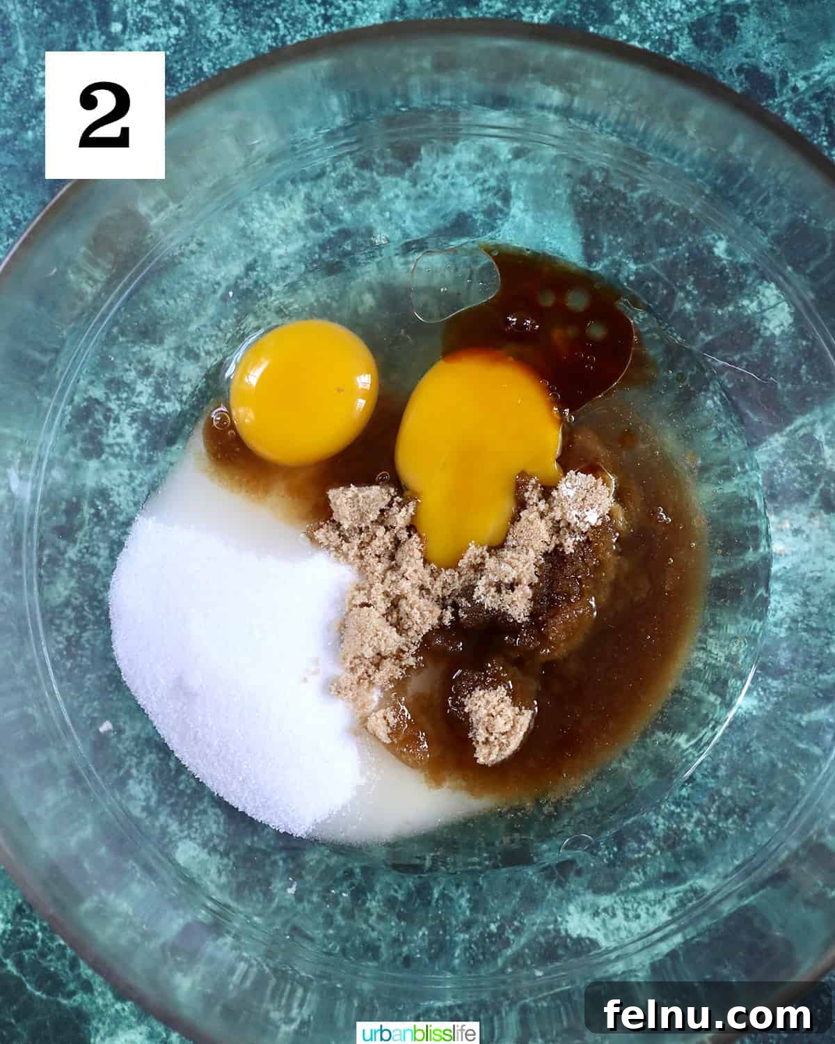 Reindeer Delight Cupcakes 6 Eggs, vanilla, and sugar in a mixing bowl