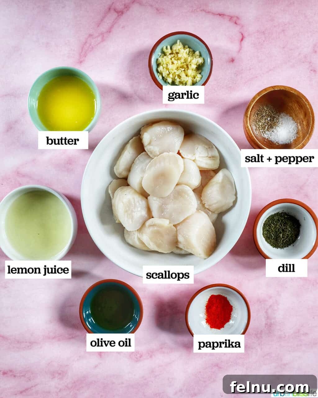 Golden Air Fryer Scallops 4 bowls of ingredients to make air fryer scallops on a pink table.