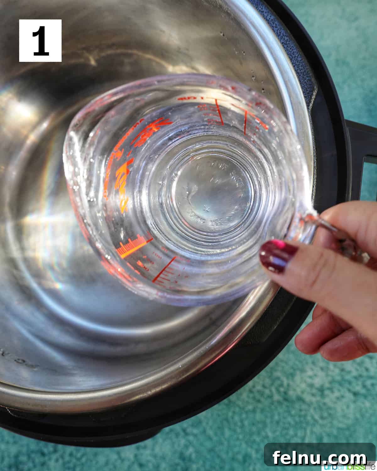 Perfect Instant Pot Broccoli 5 pouring water into the instant pot.
