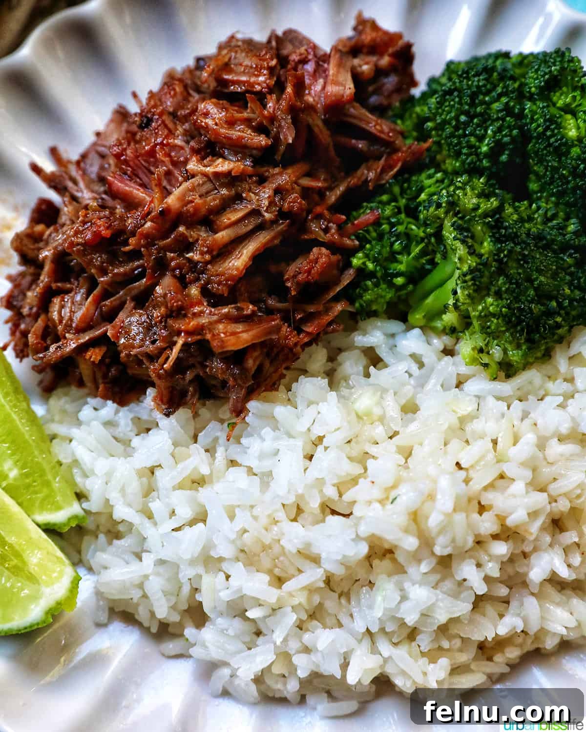 Perfect Instant Pot Broccoli 10 Mexican shredded beef on a plate with rice and broccoli.