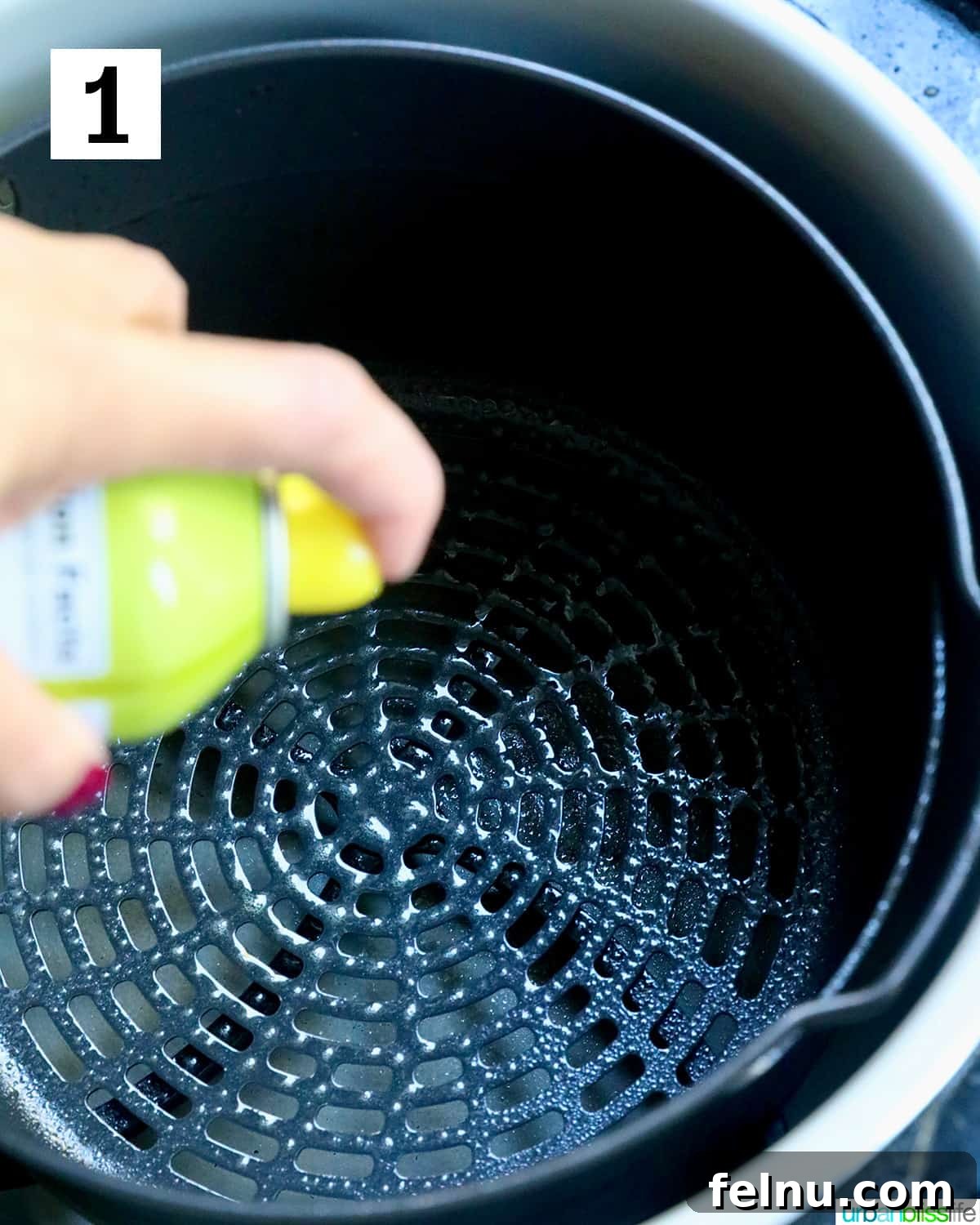 Crispy Air Fryer Popcorn Shrimp 5 Lightly spraying the air fryer basket with olive oil spray to prevent sticking and enhance crispness.