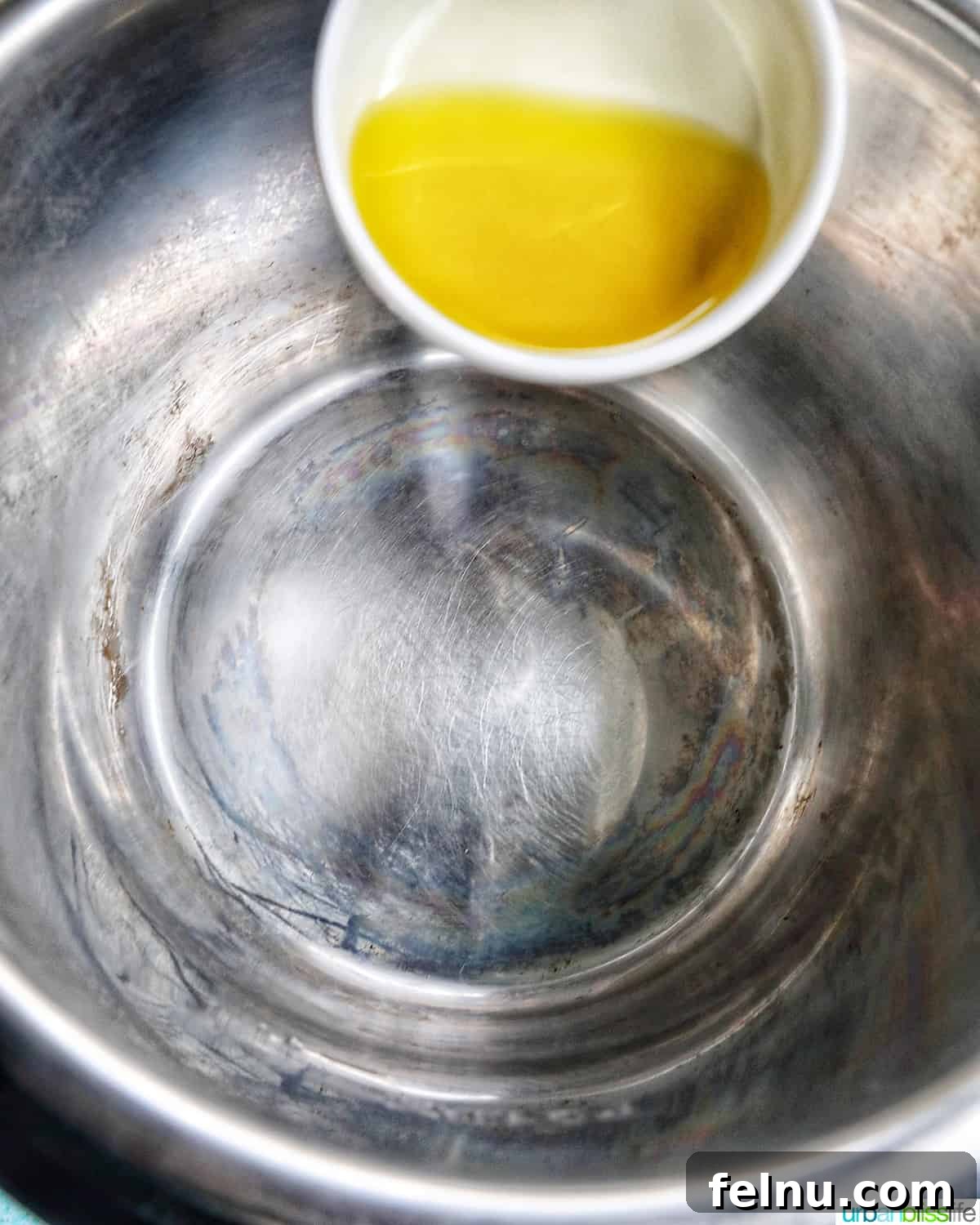 Tender Instant Pot Sirloin Tip Roast 6 adding olive oil to the Instant Pot.