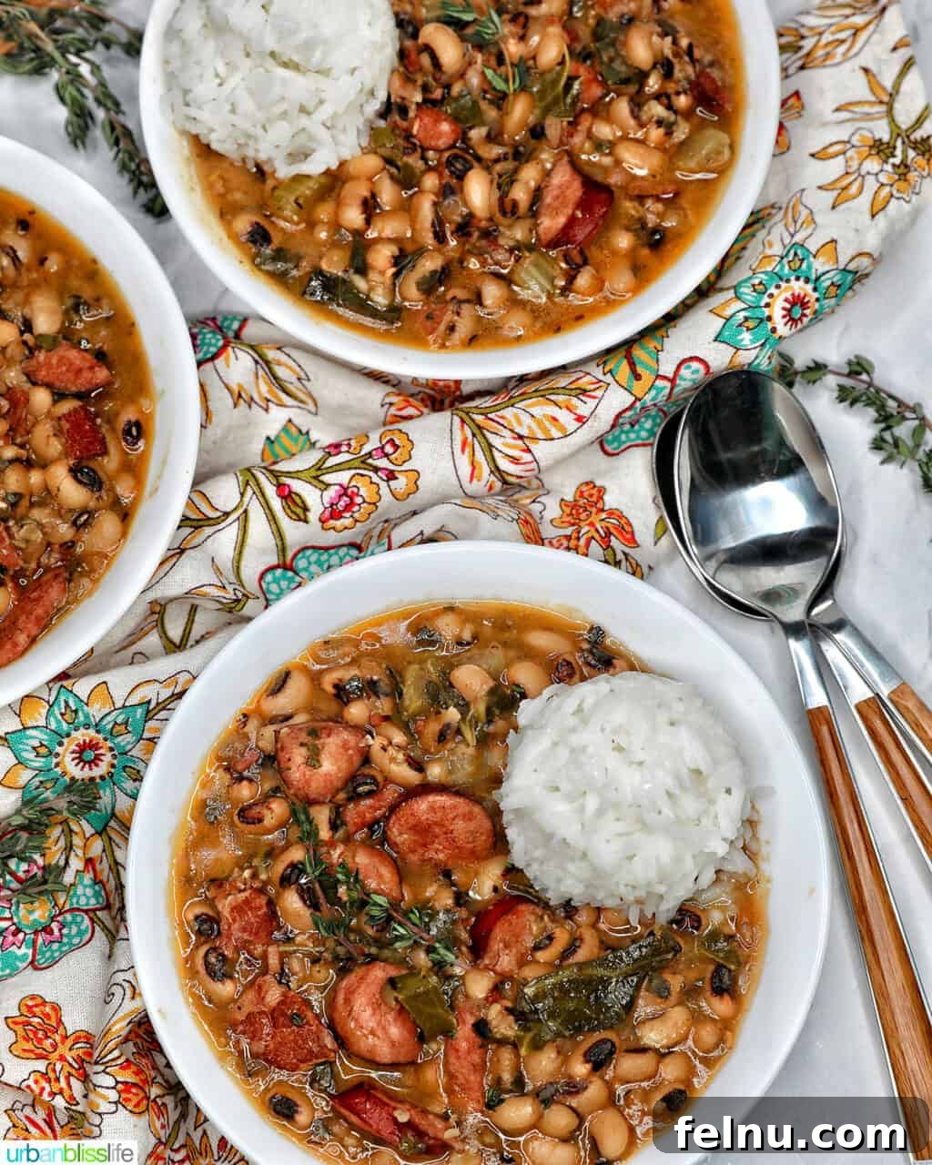 Quick Instant Pot Black Eyed Peas Soak Free 17 Instant Pot black eyed peas with scoop of white rice in white bowls.