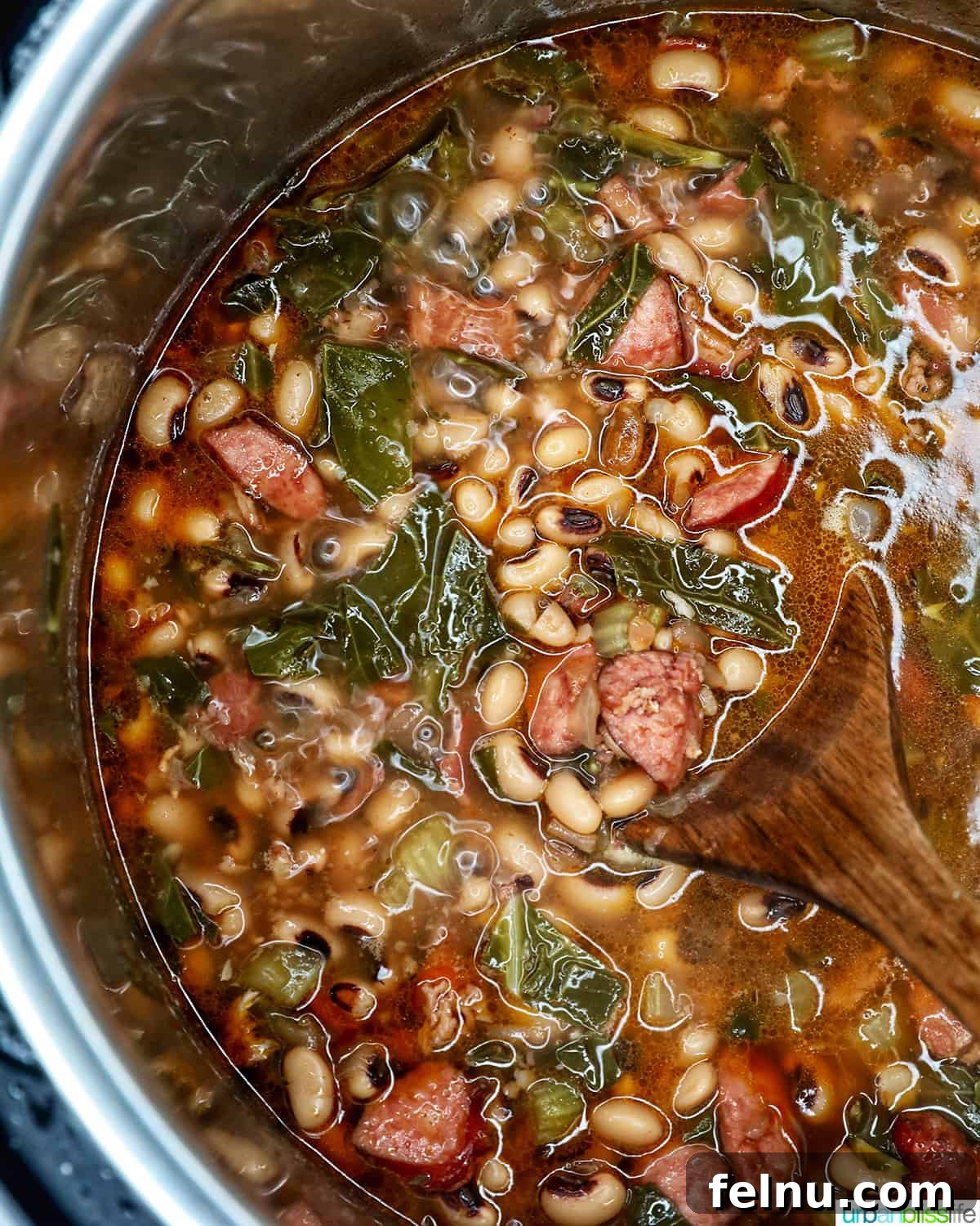 Quick Instant Pot Black Eyed Peas Soak Free 3 black eyed peas with collard greens, bacon, sausage, and vegetables in broth, in the Instant Pot.
