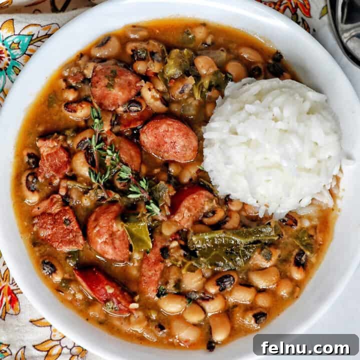 Quick Instant Pot Black Eyed Peas Soak Free 19 Instant Pot black eyes peas with scoop of white rice in a white bowl.
