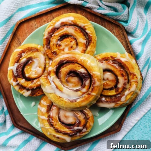 Air Fryer Pizza Perfection 13 air fryer cinnamon rolls with icing drizzle