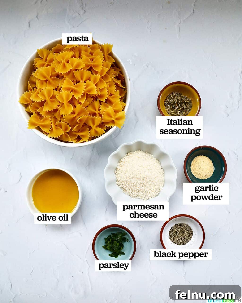 Air Fryer Pasta Chips
Crispy Air-Fried Pasta Snacks 4 Ingredients for Air Fryer Pasta Chips arranged on a white table.
