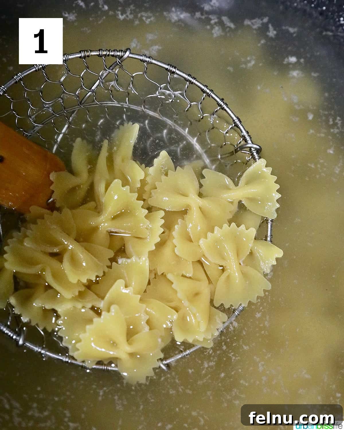 Air Fryer Pasta Chips
Crispy Air-Fried Pasta Snacks 5 Straining cooked farfalle pasta.