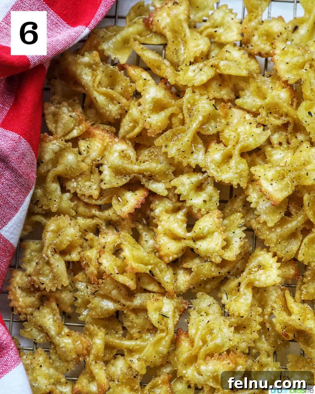Air Fryer Pasta Chips
Crispy Air-Fried Pasta Snacks 10 Crispy Air Fryer Pasta Chips cooling on a wire rack.