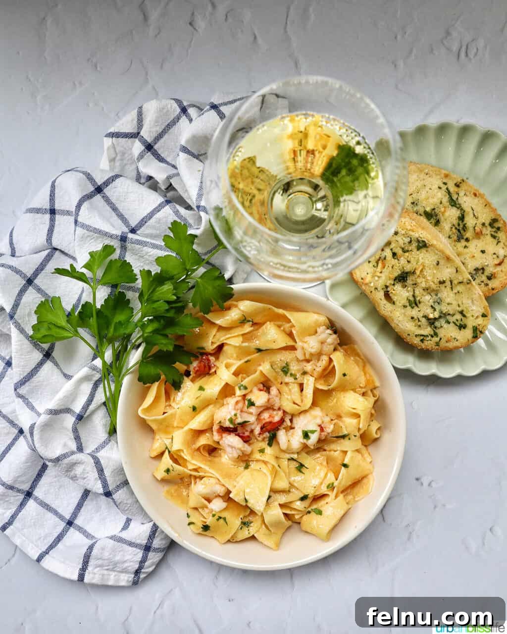 Air Fryer Garlic Toast 10 Lobster pasta served with air fryer garlic bread and white wine.