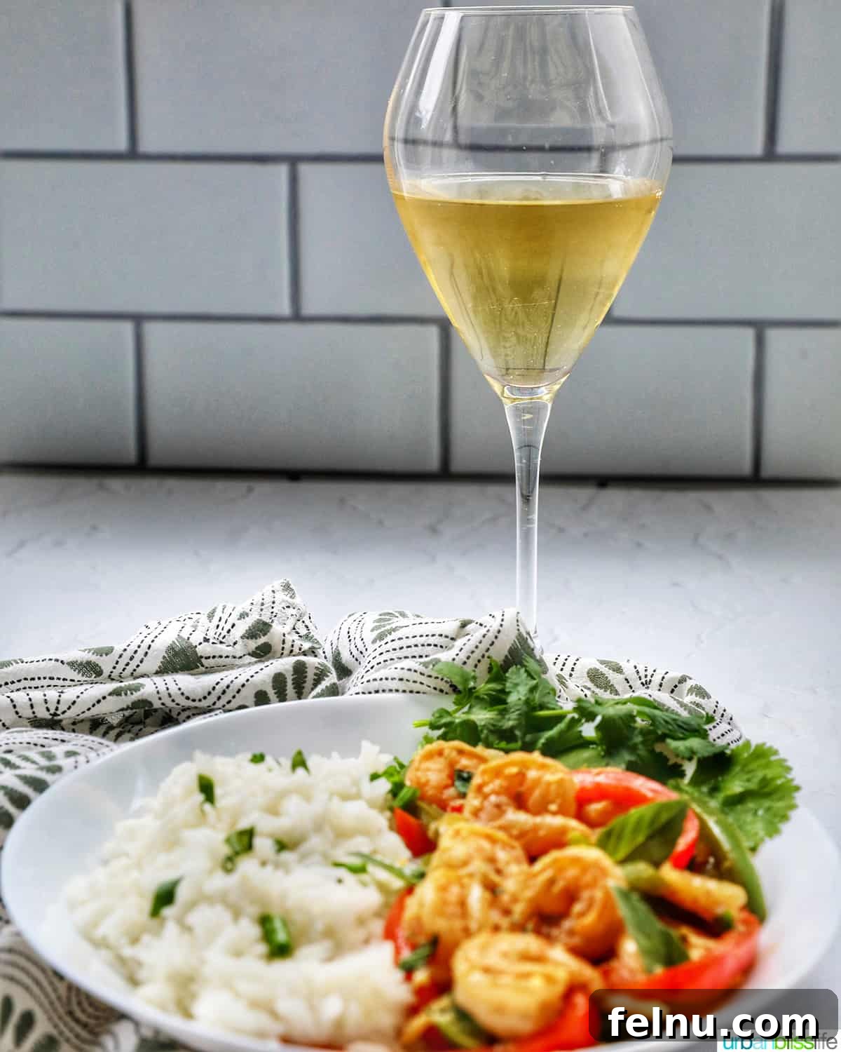 Thai Basil Prawn Stir-Fry 15 Thai Basil Shrimp with a glass of chilled white wine.