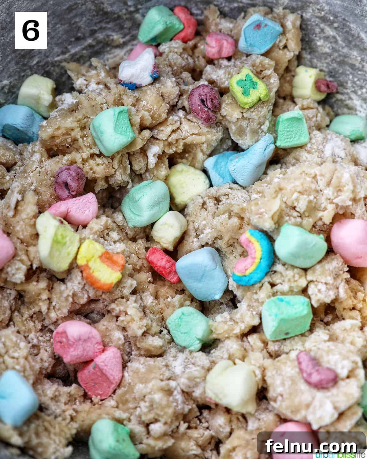 Lucky Charms Cookies 11 Adding Lucky Charms marshmallows to the dough.
