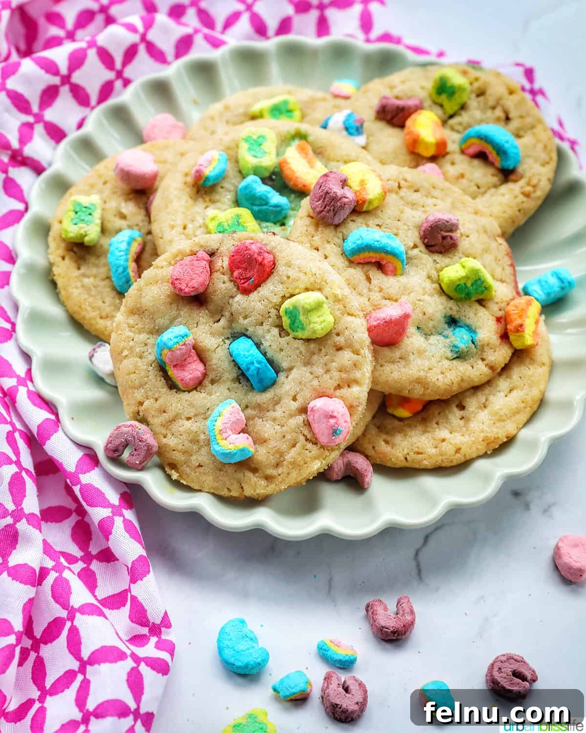 Lucky Charms Cookies 3 A stack of Lucky Charms Cookies with marshmallows, highlighting their colorful appeal.