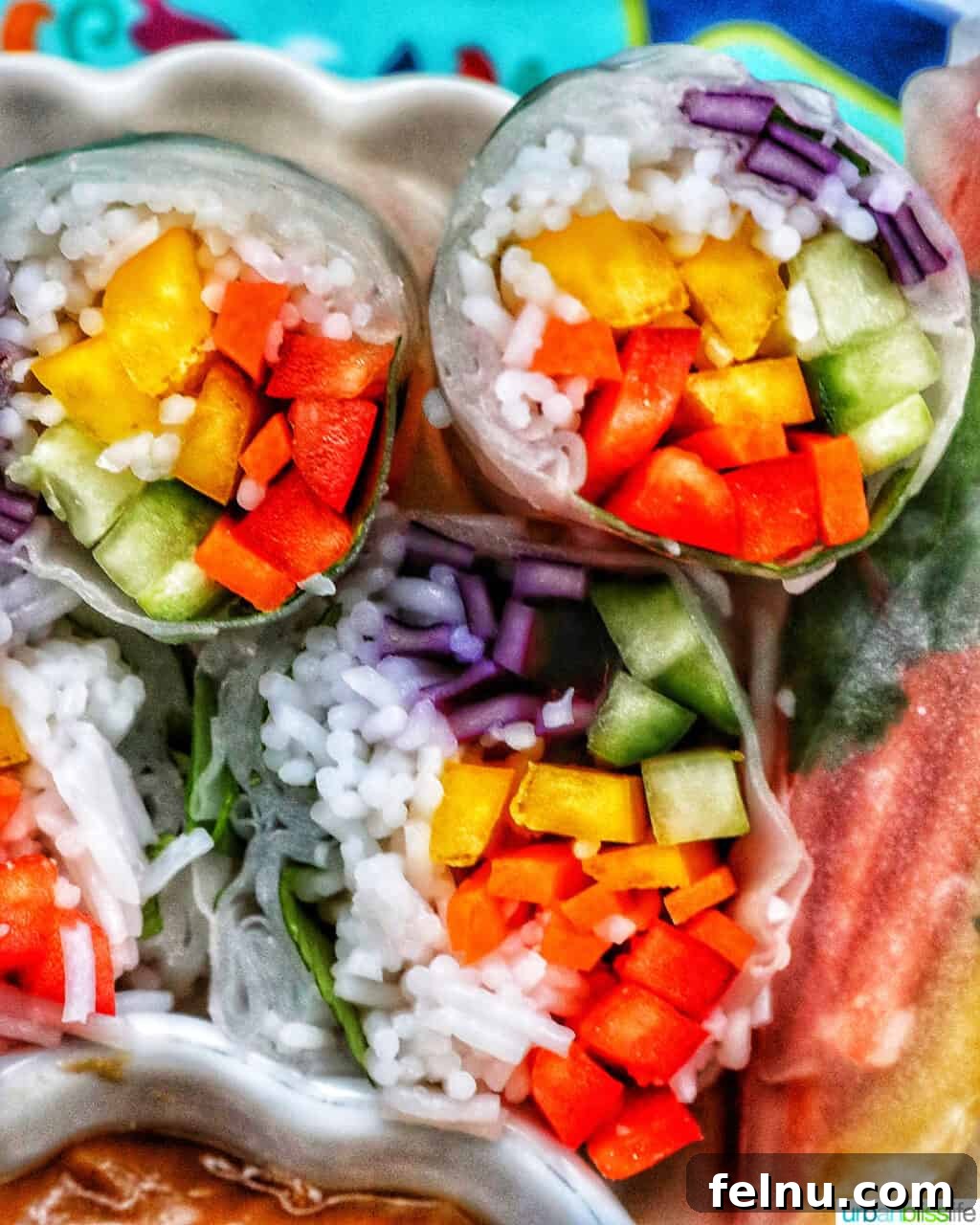Vegan Delight: Fresh Summer Rolls 11 Close-up of vegan summer rolls, sliced in half to reveal the vibrant vegetables and delicate vermicelli noodles within.