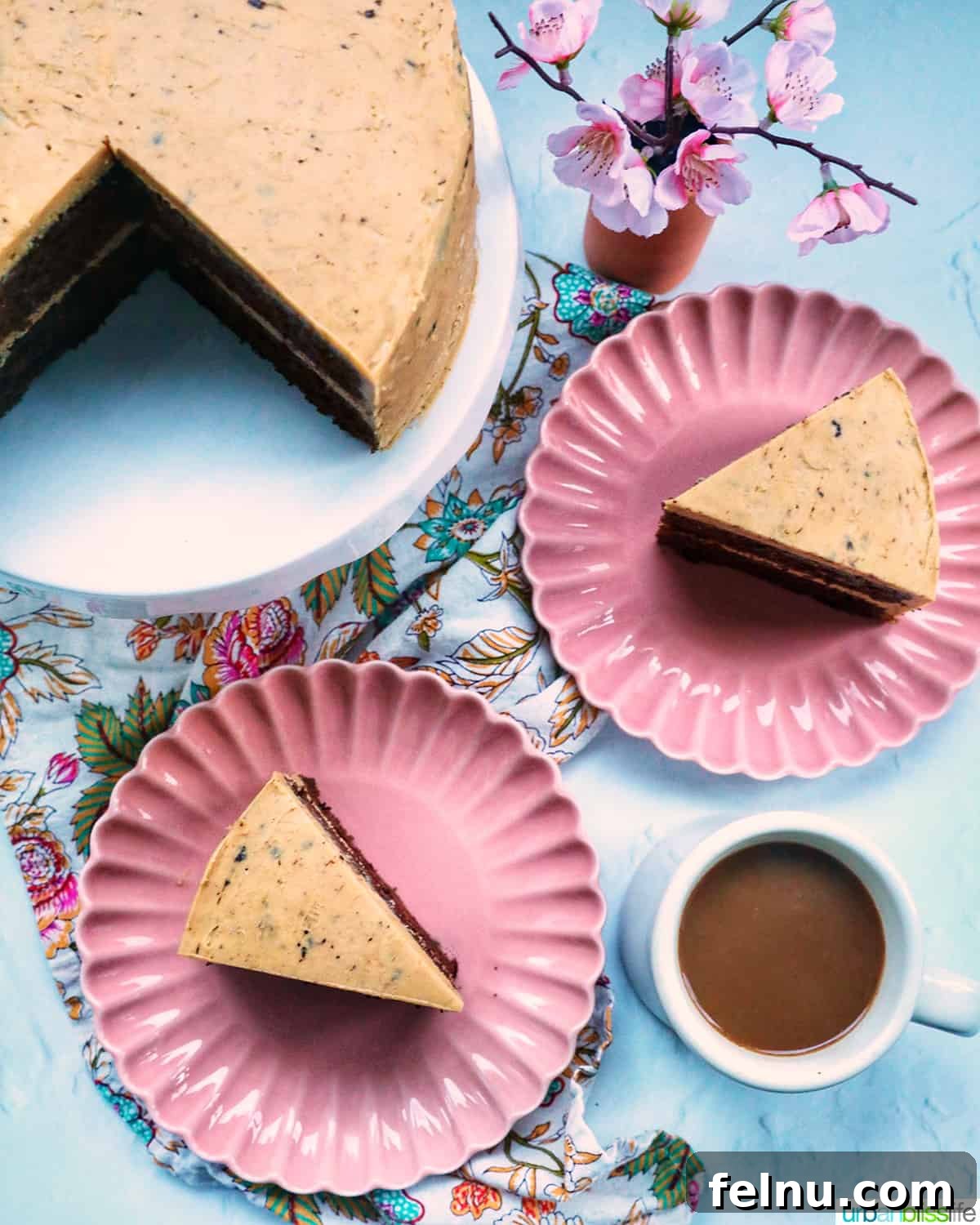 Chocolate Coffee Cake
Delicious Mocha Cake 3 Chocolate coffee cake on a pedestal with cake slices, coffee, and flowers