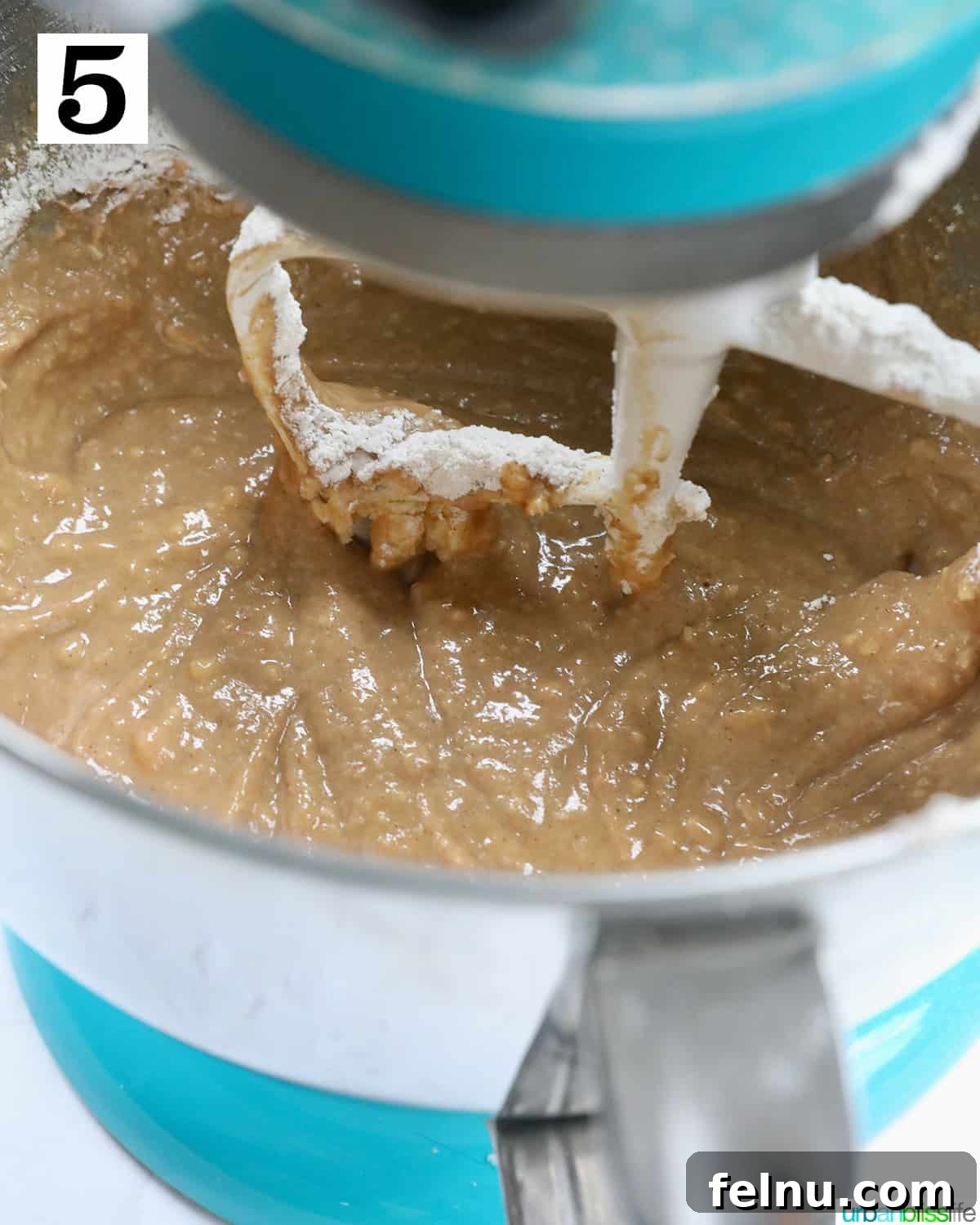 Emerald Isle Coffee Cake 14 A smooth, perfectly mixed wet batter for Irish coffee cake swirling in a stand mixer bowl, ready for the next baking step.