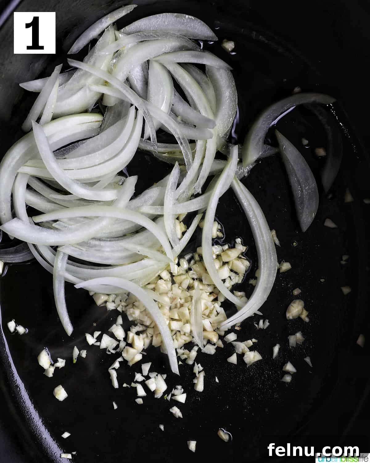 Tender Dutch Oven Brisket 5 minced garlic and diced onions in a dutch oven.