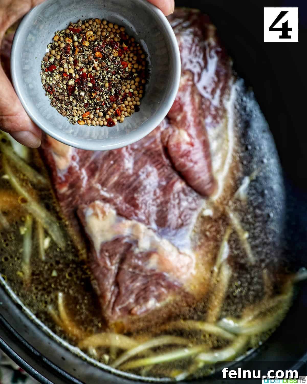 Tender Dutch Oven Brisket 8 bowl of seasoning above a dutch oven with brisket and braising liquid.