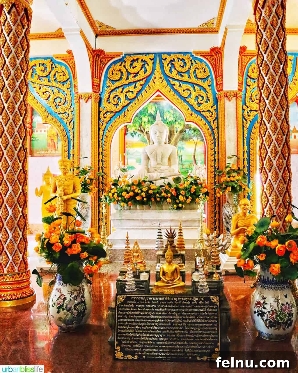 Wat Chalong Temple: A Spiritual Journey in Phuket 11 More golden Buddha statues adorning the prayer hall of Wat Chalong Temple in Phuket, Thailand.