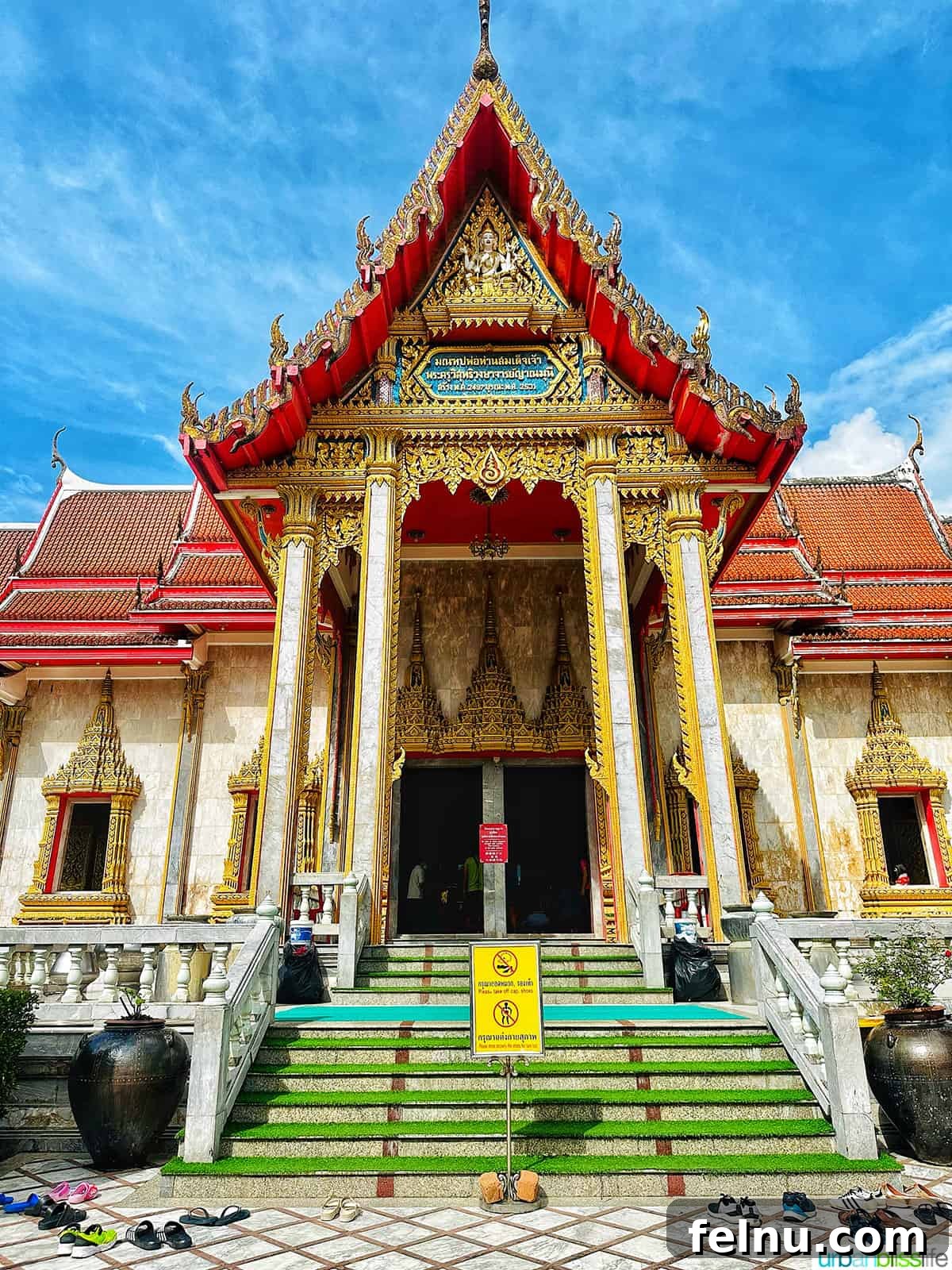 Wat Chalong Temple: A Spiritual Journey in Phuket 15 A detailed exterior shot of Wat Chalong Temple, Phuket, Thailand, highlighting its unique architectural features.